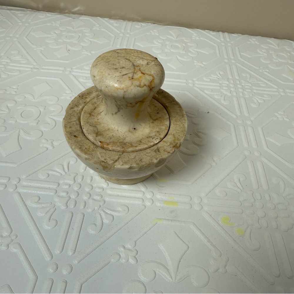 Genuine champagne marble spice grinder.